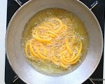 Frying-curd-muruku